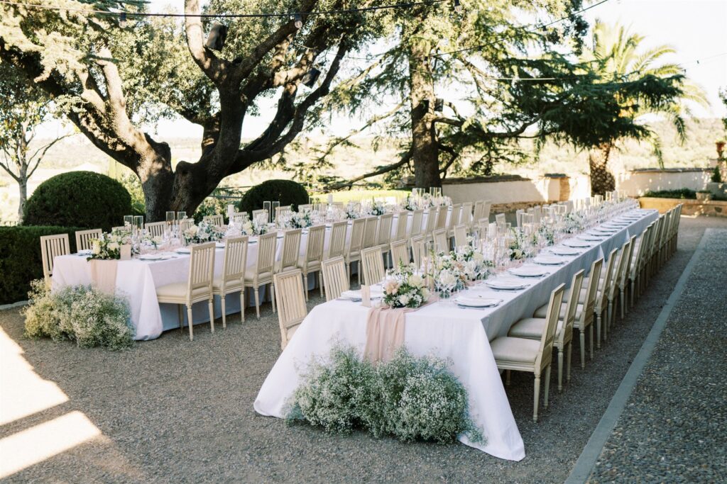 Outdoor wedding dinner tablescape in Spain.